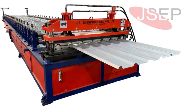 Automatic trapezoidal roofing sheet machine in operation for PEB structures. High-speed trapezoidal roofing sheet making machine producing industrial metal roof panels