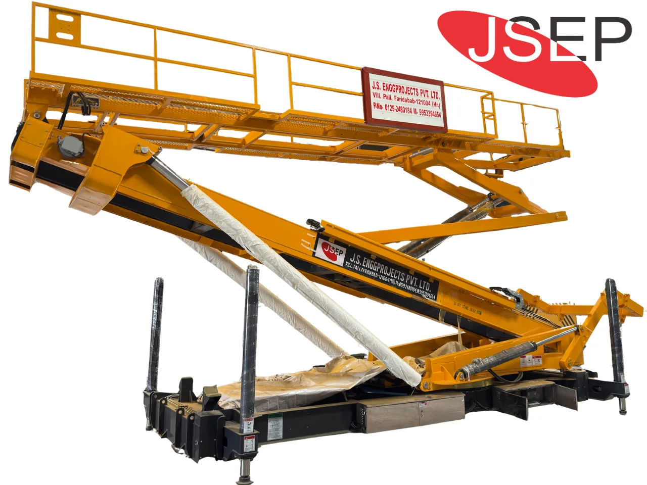 Container Profile Machine Heavy duty standing seam machine lifter elevating roofing machinery on a PEB construction site.
